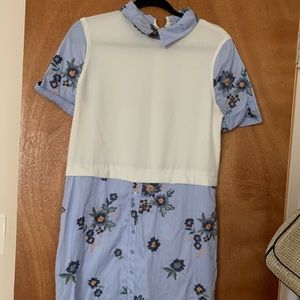Dress with floral accents and collared top